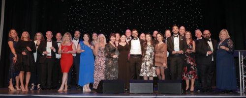 UKinbound Awards for Excellence 2022 winners group photo on stage